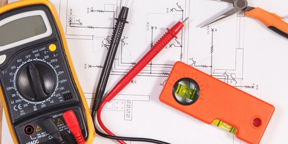 Electrical diagram with multi-meter and wiring tools