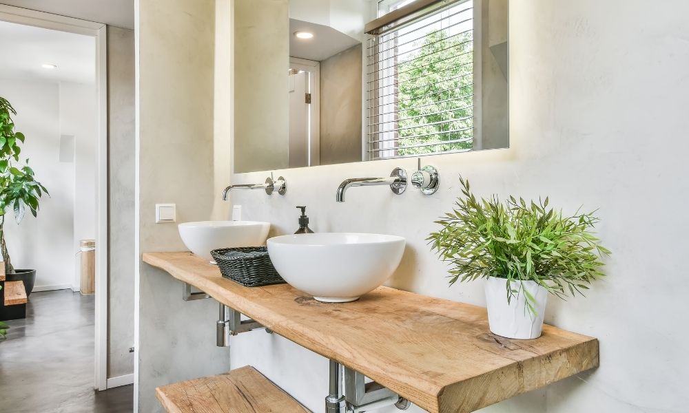 Bathroom with wooden countertop and double basin for couples