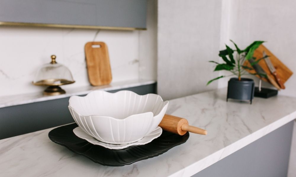 Minimalist kitchen countertop with baking bowl and rolling pin