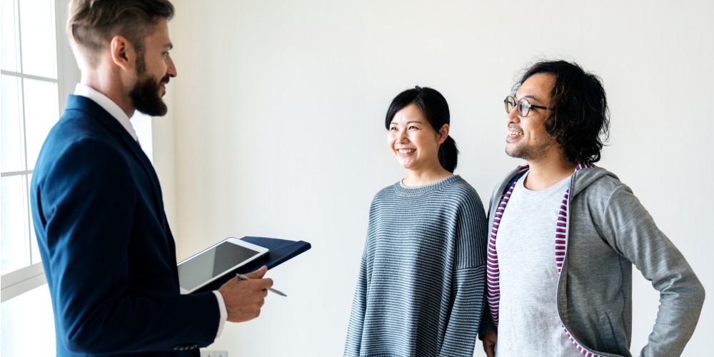 Asian couple buying new house