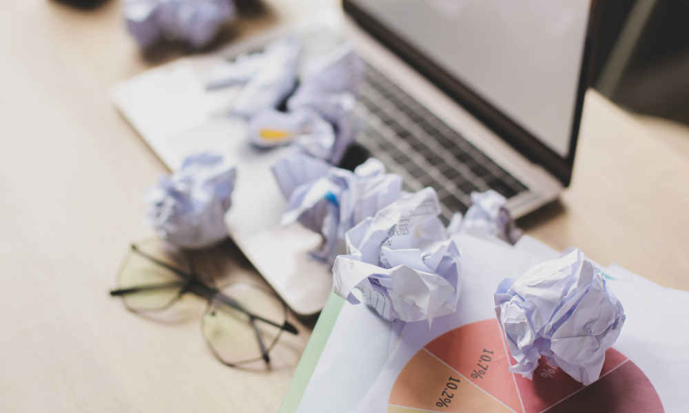 Crumpled papers on office desk