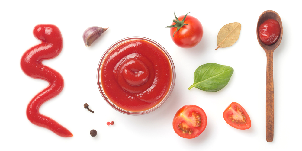Tomato sauce spill on table