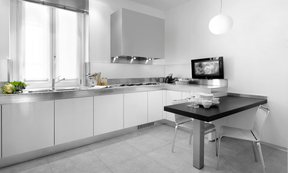 Sleek modern kitchen design with white cabinet doors and silver accents