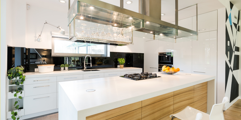 Sophisticated loft kitchen with a large kitchen worktop and modern steel hood