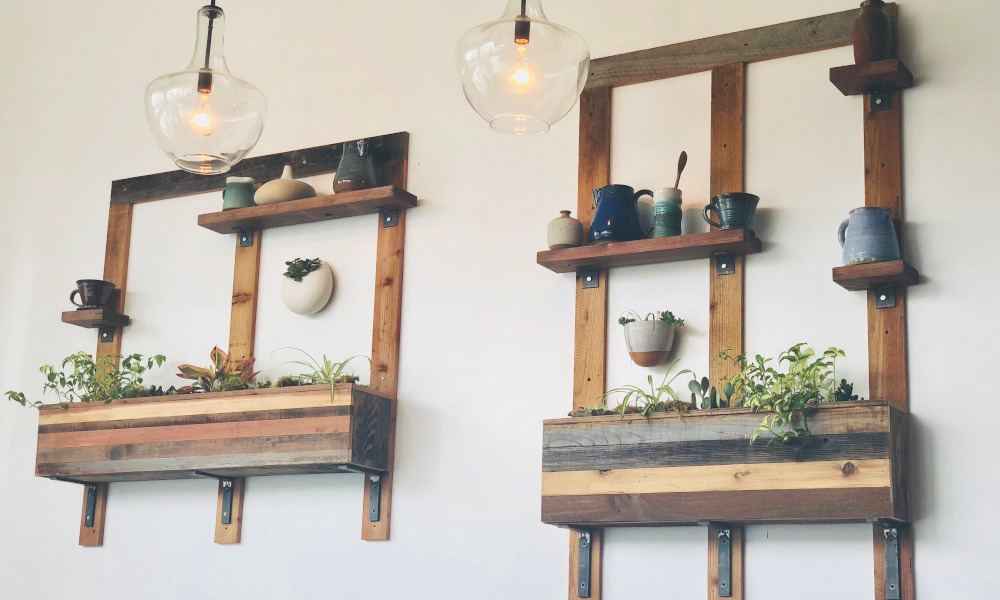 Mounted wall planters with fresh herbs for indoor kitchen decor