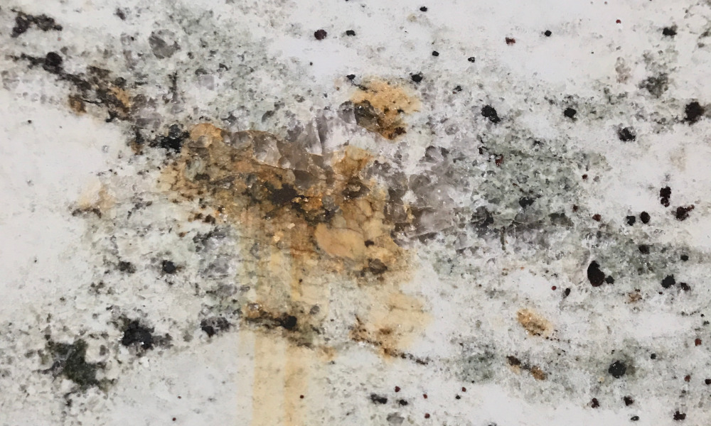 Rust and coffee stains on granite countertop
