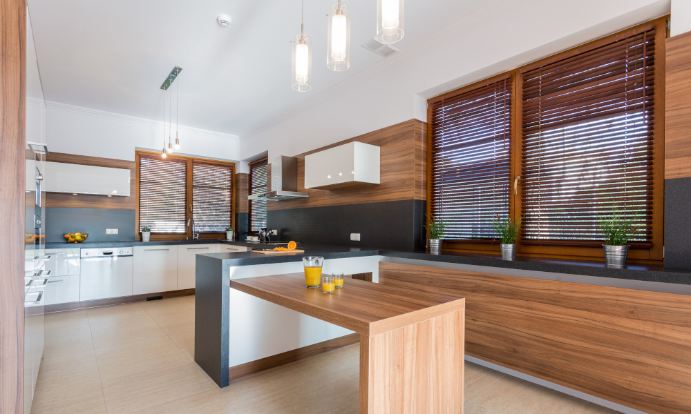 New stylish dining room with a quartz peninsular counter and wooden extension dining table