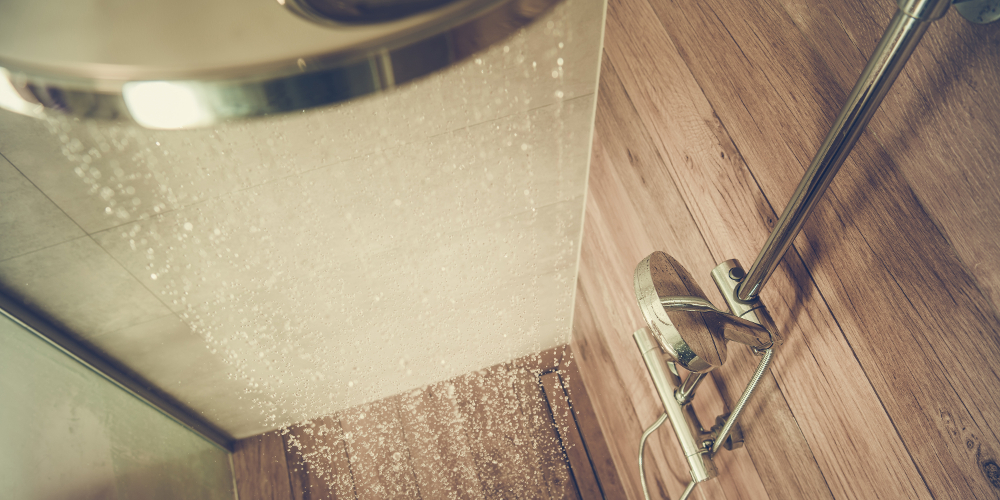 Hot water shower in bathroom with timber feature