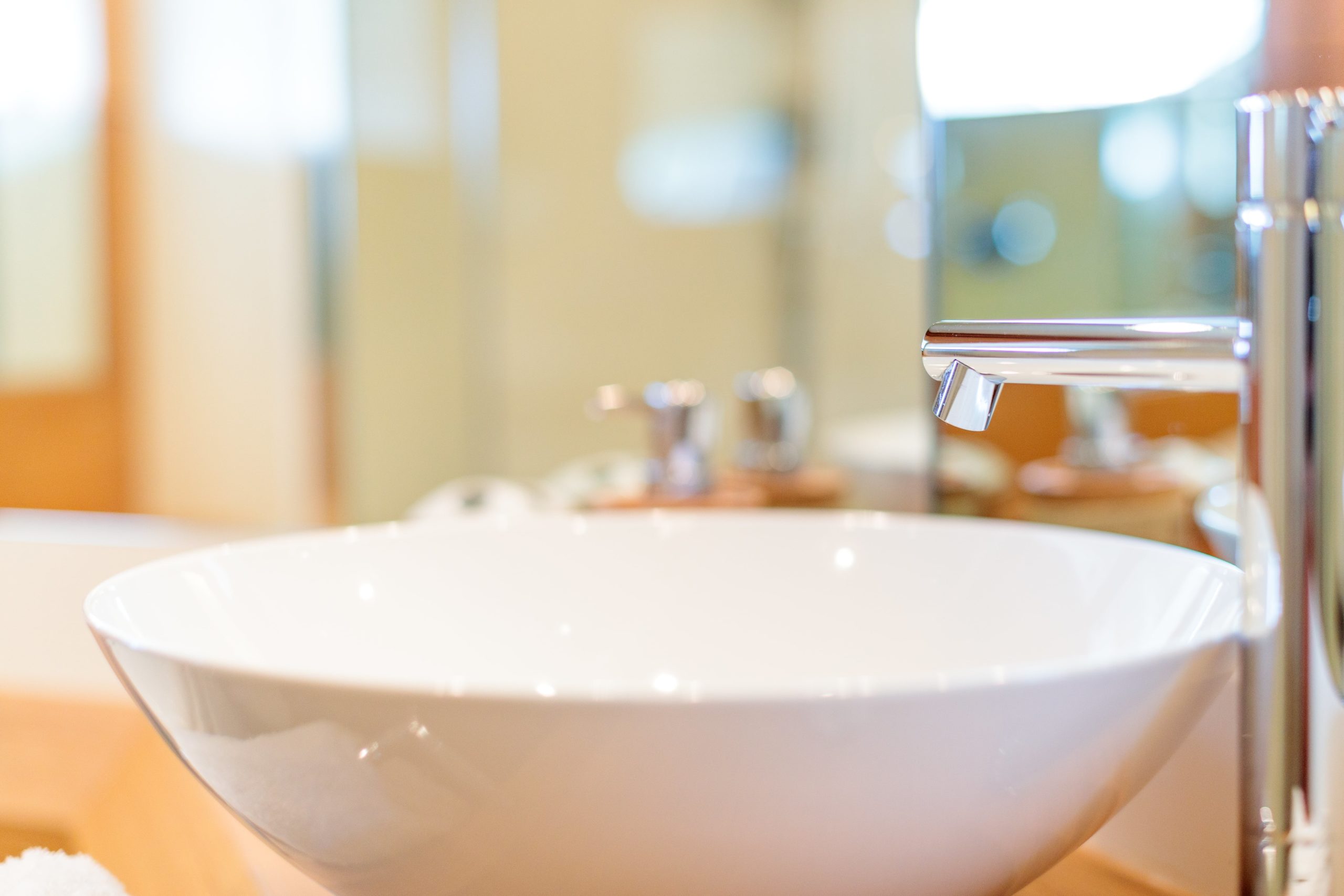 silver faucet porcelain sink